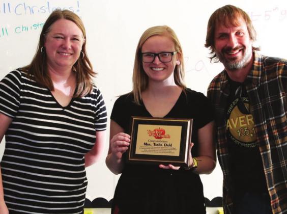 Rat and Sarah presented Drayton Fifth grade teacher, Tasha Dahl with the Marerick 105.1 Teacher of the Month plaque at the classe’s pzza party held on Tuesday, December 21st. See article on page 7. Photo provided by Drayton Public School, Darla Hoyles