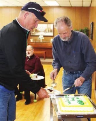 Brad Schuster and Randy Emanuelson served cake and coffee to those who gathered for Danny’s retirement celebration. VNV photo by Lyle Van Camp
