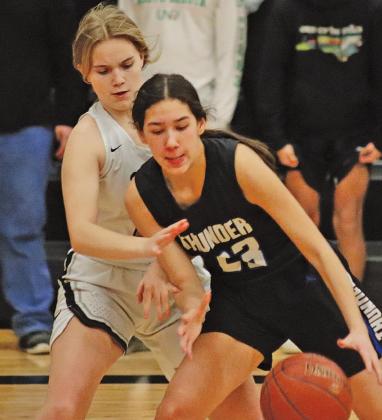 Aleah Pokrzywinski attemps the steal against Thunder player Stella Sehrt in Drayton last Friday night. VNV photo by Lesa Van Camp