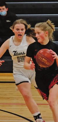 Aleah Pokrzywinski guards one of the Polar Bears during the Monday night matchup in Drayton. VNV photo by Lesa Van Camp